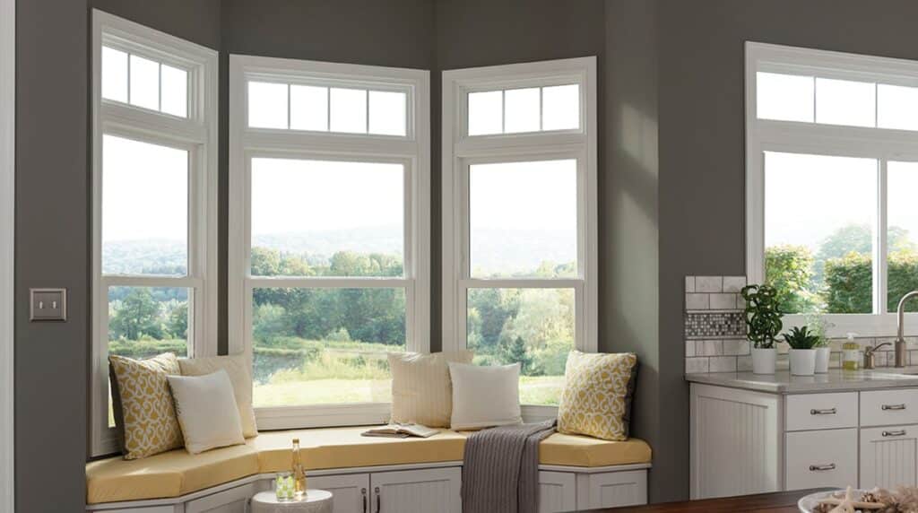 Window seat features double hung window.